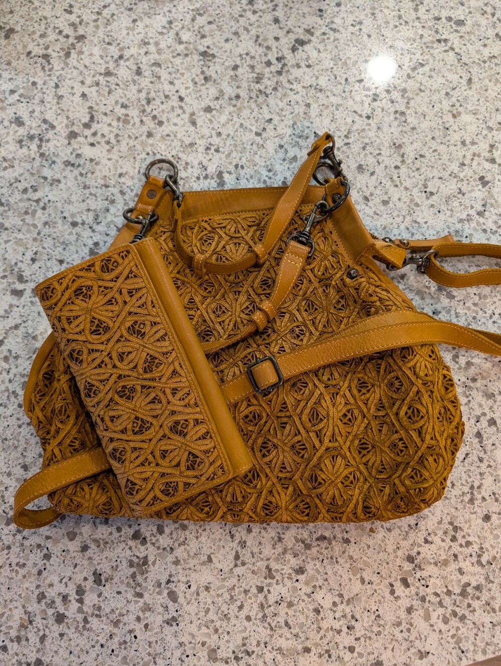 Myra Bag Boho Cognac Laser-cut and Intricate Woven Pattern Bucket Bag and Wallet